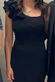 The dress was made of great quality heavy material, very comfortable and so affordable. The material feels like it would hold up well if worn multiple times. I was worried that the sleeve would be heavy and fall off my shoulder but it never did. Loved it! - Tra H.