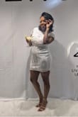 This dress was perfect for an all white party. The only thing is it's tight in the thigh area especially when you're sitting. So if you're thick in the thighs and butt you might be more comfortable with a larger size but I loved it. - Britnie E.