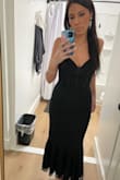 I wore this to a Sunday night wedding in Florida and loved the details of the lace overlay and mermaid bottom. The corset is sexy but not too tight&it fit perfectly. I did need to adjust the straps to be tighter but that was easy. I paired it with 3 inch heels and a shawl during the ceremony. - Risa C.