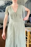 Per usual, I am between sizes with Lulus. The small is clearly huge on me, and the XS could use about 1/4" more room in the waist. I'm keeping the XS because I like the dress, but because it's *just* tight, I am already experiencing (only trying it on, not actually wearing or washing yet) the same issue with the zipper and stitching that other reviewers have mentioned. I guess it's a good thing we're having a cold March and I have plenty of time to hand stitch/reinforce the seams before actually wearing this in warmer weather. So, 3 stars for quality (I shouldn't have to reinforce something that costs over $50) and because neither of these really fit me, but I do like it enough to keep it. I think if your waist is several inches bigger than mine and you have a mid-to-larger pair of girls, then the S would likely be a good fit, and if your waist is an inch smaller than mine, the XS is an easy choice. I will say though this may be the first full length Lulus dress I've ever bought that I didn't need hemmed. - Ani D.