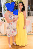 I am always between sizes on Lulus. I ordered both the XS and S and tried them on back to back about 15 times (no joke) and finally decided on the Small, but let me tell you what I struggle with for both of them:
XS: Fit very tight around my rib cage. This was good for keeping the dress up so those super skinny straps didn't dig into my shoulders (it's a heavy dress), but left no room for a bra, the V was still quite low (which made me uncomfortable to go braless for fear of a wardrobe malfunction), and the pleating across the bust ultimately just looked wrong and was the biggest deciding factor in not choosing the XS. Also I wanted to breathe, and it was hard to inhale.
S: Looser around rib cage. Pros: can breathe, can wear bra, scandal averted. Cons: does not hold dress up, ergo entire weight of dress on those skinny straps that dug into my shoulders all night. The dress was beautiful and a big hit, but ow. Also needed to be hemmed like 4" even with heels. - Ani D.