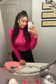 It is a little more of a crop top, but looks really cute with a high waisted bottom! - Marlene R.