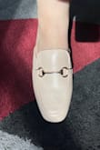 So, I dislike when reviews are not thorough so I hope this helps lol! This shoe will elevate any outfit whether you're going for a chic business casual or literally wearing these to the office. The gold piece on top makes the shoe look that much more elegant and clean and it's really sturdy and stuck onto the shoe so it does not look cheap. This shoe is very much true to size so if you order your actual size, your heel should meet the end of the shoe - nothing more, nothing less. I am a true size 9 and an 8.5 in sneakers like Adidas. I did read a review about the shoe squeaking, it does not squeak at all unless you do not wear socks (yea there are special half socks for these kinds of shoes) which is to be expected when bare skin sweats in leather or plastic. The shoe's heel does make a loud clacking sound which I personally really love, but I am very extra lol. The heel adds about an inch more to you. The actual shoe itself has a lot of room for your toes, however, if you have wider feet I would not recommend - Kroeksak O.