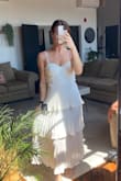 Love this dress! Very flattering. The only issue I have is that when it arrived, the strap was fraying. Not a huge deal, just kind of a bummer! - Lauren D.