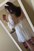 This is my second time ordering from Lulus. After looking at the reviews, I was sure that I wanted to go with this dress for my bridal shower! The shipment came two days early, which I was excited about. I ordered a MEDIUM! When I tried it on, the sleeves were a little long, but the dress was NOT too short (which is what I was worried about). The waist is stretchy, and the strings in the back can tighten or loosen the dress. I tied mine tighter. It fit fine, but I did exchange it for a small one because the sleeves kept slipping off my shoulders. The cups were also slightly large. Pro tip: pull the dress down more so that the cups are snug against the breasts. It looks & feels better.

I think the small will fit my body a bit better! I got so many compliments when I sent it to my friends!

(Headband is from Amazon).

- Madison, MN - Madison F.
