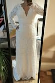This dress is quite beautiful. I'm sure it would suit many women but this style is just not for me. There are so much details and I'm very classy usually so that would have been a big step for me to wear this for my wedding. I'll go for something more bohemian chich however nice piece for taller women. - Sophie D.