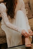 This dress turned out to be the perfect wedding dress for me. It was everything I wanted. I did have to get it altered, but that is typical for a wedding dress. LOVE! - Baylee S.