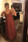 I love this dress! I will be wearing it as a bridesmaid in my friend's wedding. It is a beautiful dusty rose color. Fits great! The straps dig in a little at the shoulders- I think it's just because I have a larger chest (lol)
Pretty and comfy and very full skirts. Looks so elegant. - Jessie A.