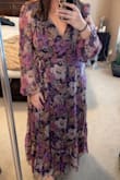 Big fan of this dress. The cut is a little low but I was able to pin the bust. The rest is very pretty, flowy, flattering. Colors are bright and perfect for spring. Lightweight. - Lisa H.