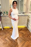 I needed a last-minute maternity wedding dress. I ordered this dress in an M and L since I was 7 months pregnant and didn't know which one would fit me. The M was just a bit too small and the L fit me perfectly! It was stretchy and hugged all parts of me in a very elegant manner (as you can see in the pics)!! I really felt like a princess on my BIG day :) I would highly recommend this dress for any soon-to-be mamas for any occasion!! - Cristina C.