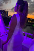 The material is very stretchy and flattering. I wore boob tape to cover my nipples/shape my breasts and wore nude no-show panties. The dress is so incredible. The front neckline is classy and the back is flirty while still remaining modest with the length. So obsessed And perfect for a white party on a yacht in Miami! - Hillary P.