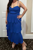 The dress is beautiful! I just had a baby and was looking for a dress that was flirty and sexy, but not tight. This was perfect and I got so many compliments. The dress does have extra fabric on top, but when you stand straight you can't even notice it. - Elizabet M.