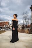 I wore this dress on my wedding day, and could not stop getting compliments. Fits perfectly, was a little long but I'm super short. The arms weren't a big deal to me, they were more flexible after about an hour of being in the dress. 10/10 recommend and I'm so thankful I chose this dress! - Denise P.