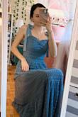 I bought this dress for my friend's wedding in May. I love how it falls over me like a curtain. It's not heavy, but it's not light. It's beautiful! I can't wait to wear it. - Caroline M.