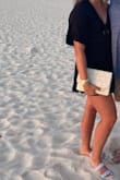 Beautiful beaded bag! Cute to wear out to dinner. I tucked the strap in and used it as a clutch. - Ashley B.