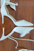 Loooove these shoes and can't wait to take my pre-wedding photos in them! I ordered a full size down after reading the reviews but it was still loose on me so I exchanged it for half a size smaller. I usually wear a 7.5 and for these shoes, size 6 fits me perfectly. In one of the photos, I compared them with another Lulus shoes. The other ones were 7.5 and this was 6.5 and they were about the same size. I'm wearing size 6 in the second photo and it fits perfect. - Htet Y.