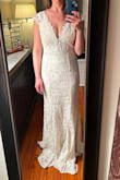 This dress fit me pretty well, but the chest area is a little loose and the shoulders/straps are also loose. I am having it shortened, but don't think the looseness at the top is worth altering! - Christina W.