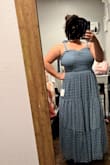 This dress is so so beautiful. I was sad when the bust area fit a bit too small. I usually can fit a large I had to squeeze into this dress. Well only my chest area was tight. If you have a smaller bust you do not have to size up. For the bustier ladies, I would recommend to size up. I'm sad I have to return it to get a bigger size. This is the dress I am using as a bridesmaid so excited just sad I have to exchange it. - Mirsa T.