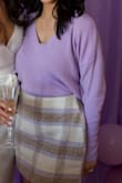 The skirt had a little too much extra fabric on the side. It's shaped for a woman with wider, fuller hips. 

That's not me, but it was final sale so I wore it anyway. - Melissa L.