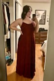 This dress is wonderful! I am 5'10", and the length is perfect with a heel. Touches the floor without. It's the tiniest bit tight to zip up, but not enough to size up. Love it! - Kelly H.
