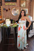 Wore this dress for my baby sprinkle, fit well for my growing belly at 8 months. Was quite long, I'm only 5'2 but not really a problem with some heels. - Rosanna S.
