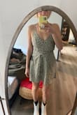 Had to wrestle with the straps, recommend a buddy for tying it all together :)
But the dress is darling, so flattering, not too short. I love it! - Chandler M.
