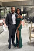 Wore this to a wedding got endless compliments. I ordered an XS and it hugged every curve. The shoulders are a little annoying and make it hard to dance and limits overhead movements. However overall it is an elegant dress made of good quality material. - Iris A.