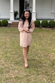 Absolutely LOVED this dress-bought it for my best friend's wedding! I got so many compliments. Unfortunately, the only full body shot I got was one my husband took of me randomly. The sleeves were 100% my fav part of the dress! - Allison M.