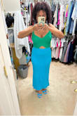 The material of this dress is thick, it's a bit heavy and it has a lot of stretch but it fits me perfectly. So unique combination of colors and they are as pictured. Going to wearing this next week to my trip to Panamá City. - Maria S.