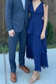 Fit really well, had to shorten the straps since my torso is short and I didn't want to flash anyone (you can't wear a bra with the dress). Overall felt like good quality fabric and is very flattering. - Laura F.