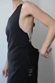 I'm usually in between a small and a medium dress size, so I bought both to try. I was swimming in the medium. Big gap in the back (you could see my underwear) and so long it looked frumpy from the front. The small fit great. - Gwendolyn B.