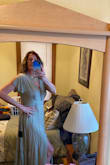 The size large fit beautifully, but couldn't zip it all the way up, too tight through the chest and back. Ordered an XL and fits beautifully. A little loose in the waist, but still looks nice! Love the material and flow! Length is excellent for us tall girls! - Kerry S.