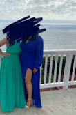 The color is easily the best part of this dress; photo doesn't do it justice due to the overcast beach day, but it really pops! I ordered this last min for a beach wedding and definitely, should've sized down; sleeves were too long and it was too large in general and didn't flatter me like I would've preferred. I think if I would've sized down however it would've been a bit better. super comfortable though - Taylor H.