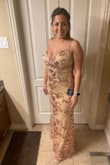 Perfect fit and absolutely beautiful! Bought it for my goddaughter's Quinceanera and it was perfect! I received so many compliments on this beautiful dress! - Jeannette G.