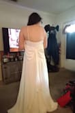 This is a beautiful dress. It fits great but is too long gonna have to get it hemmed. I plan to wear this to my wedding reception. - Crystal N.