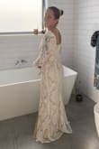 This dress is absolutely gorgeous and I cannot wait to get married in it! I'm from New Zealand and it arrived very quickly also. - Elle