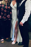 This dress was perfect. It had a nice stretch to it and was good, thick material but not heavy to wear. A little big in the top for me but I just used tape and it was fine. It was better than several other much more expensive dresses from other companies that I needed up returning. I'm 5'9 and it hit the floor perfectly, didn't need to alter - Brianna T.