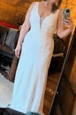Absolutely love this dress. I was in between sizes and ended up going with the smaller size which made a huge difference. Great dress and the price can't be beat!!!!! - Heather L.