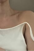 Reading the reviews, others who purchased this tank in white are unable to wear the top. The straps are so long, it's hanging and not covering my bust. - Jaclyn M.