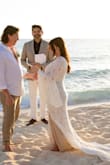 Such a beautiful dress for a beach wedding! I was 24 weeks pregnant and it had no stretch. I originally ordered a medium but had to return for a large. I was very satisfied with my dress and received so many compliments. 
5'2 148lbs - Brittany P.