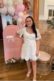 I got a size medium and had the top altered because it was a little too big but if I had sized down to a small it wouldnt have fit my hips. Super cute dress & got lots of compliments! - Marissa C.