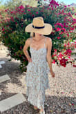 This dress fits great & is fun & flowy! Would recommend - Leah C.