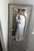 Super pretty and elegant but I couldn't move my upper half without being afraid to rip it. It was really right around my chest and I don't have boobs as it is. The rest was fine though. - Mariel R.