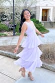 I listened to the reviews and sized up and it fit great! The wasit band of this dress is just super tight, which is why I sized from a S to a M. - Angela L.