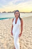 I bought this jumpsuit for beach pictures in Cabo. It fits like a glove and is so flattering. I am 5'4 and did have to hem the legs probably 4-5 inches. - Susan G.