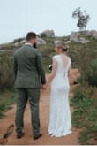 This dress is lovely, for the price point, the quality of the material can't be faulted. However, when I put my dress on the morning of my wedding the zip broke and would not go up or down so essentially I was stuck in the dress with the zip at the top and a gaping hole where the zip had come apart. It was totally mortifying and very embarrassing to walk down the aisle with a hole in the back of my dress that all my guests could see. 

I would hate for this to happen to another bride and for this reason, I cannot recommend the dress or Lulu to anyone. 

Lulus has said they will refund the cost of the dress however that doesn't make up for the disappointment and embarrassment I felt on what should have been a day when I felt amazing and confident.

Very disappointed indeed. - Suzie F.