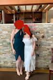 I ordered a M and an L, ended up sizing down to a M because I liked the fitted bust better, but it meant that the dress wasnt going to be that midi length that the listing shows. I actually liked it better. Got so many compliments and I felt like a million bucks!! (Just be mindful that it could be very easy to flash someone when you stand up from your seat.) - Sara R.