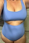 I ordered a size Medium for a cruise I am taking in July hoping I could lose another 10-15 pounds to wear the suit. It actually fit me. Even the bust which was a shock. The only thing small is the butt.  With the model it looks like it shows her butt too so I guess it's the style. I love the color and the fabric. People commented it was too thin but I think it's fine. - April K.
