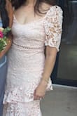 I loved the dress. I ordered it for a wedding. After putting in my measurements, the website suggested a small. It was a little too tight for my liking but I still would order it again. - Daniella S.