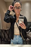 I bought this for a recent trip to LA and it was absolutely perfect.  Definitely, lightweight which is what I wanted.  I wouldn't consider it a jacket. Fits TTS. - Janice G.